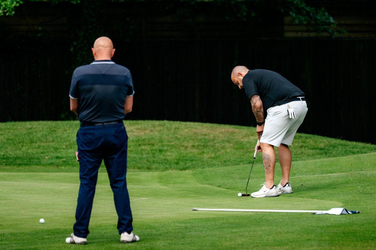 Golfers playing at The Old Thorns Hotel & Resort