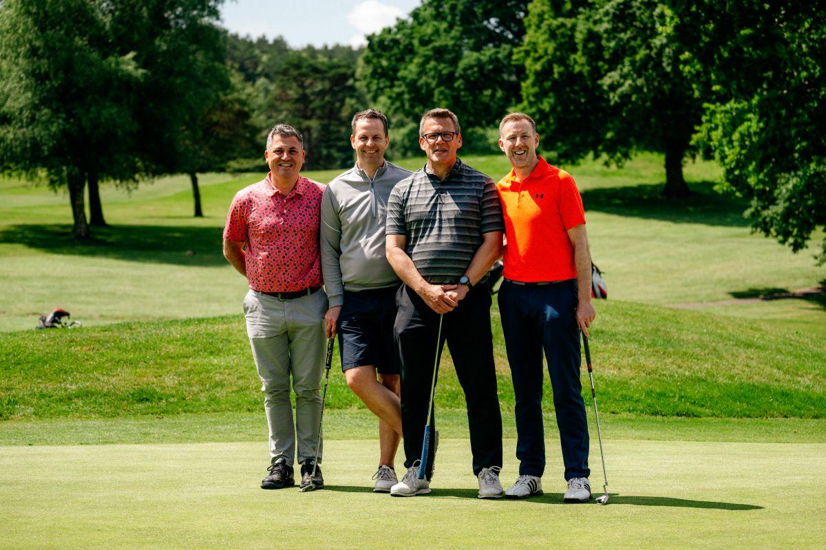 Golf team playing golf at The Old Thorns Hotel & Resort