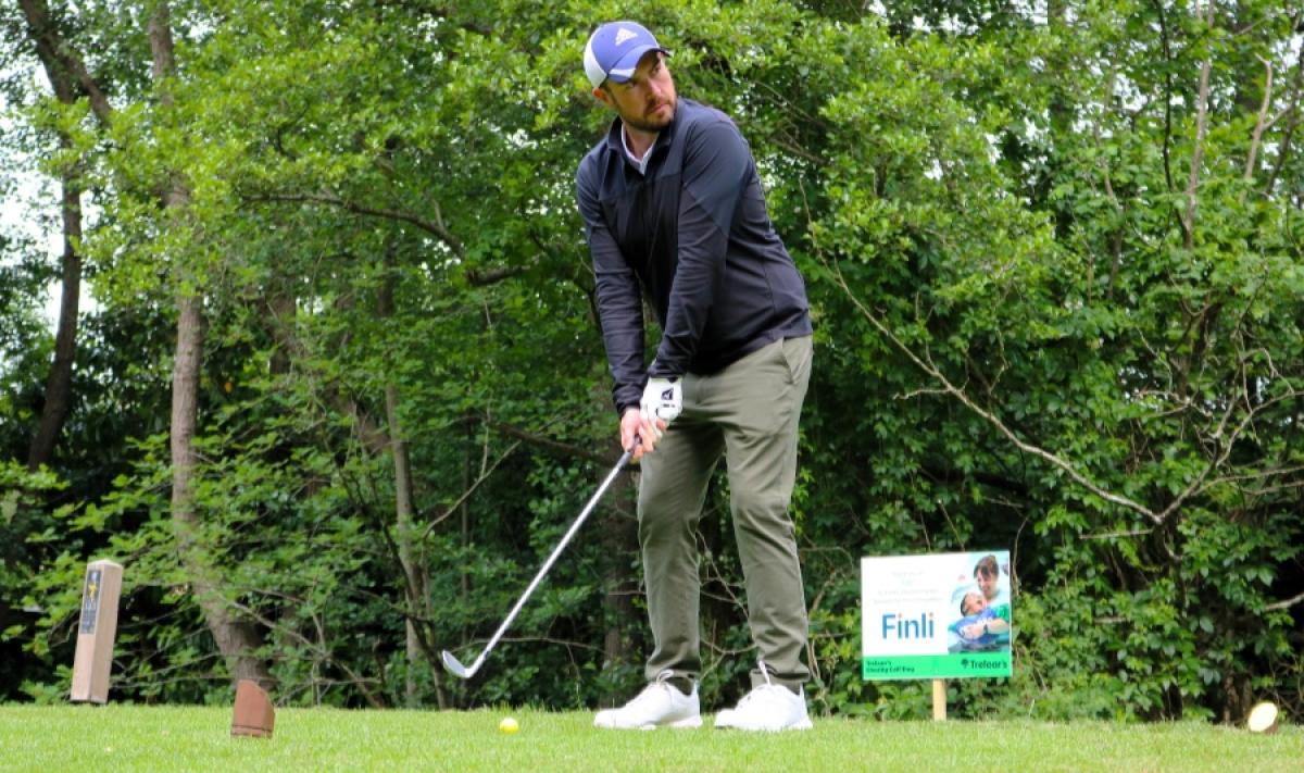 Action shot of golfer on the green at Old Thorns Liphook
