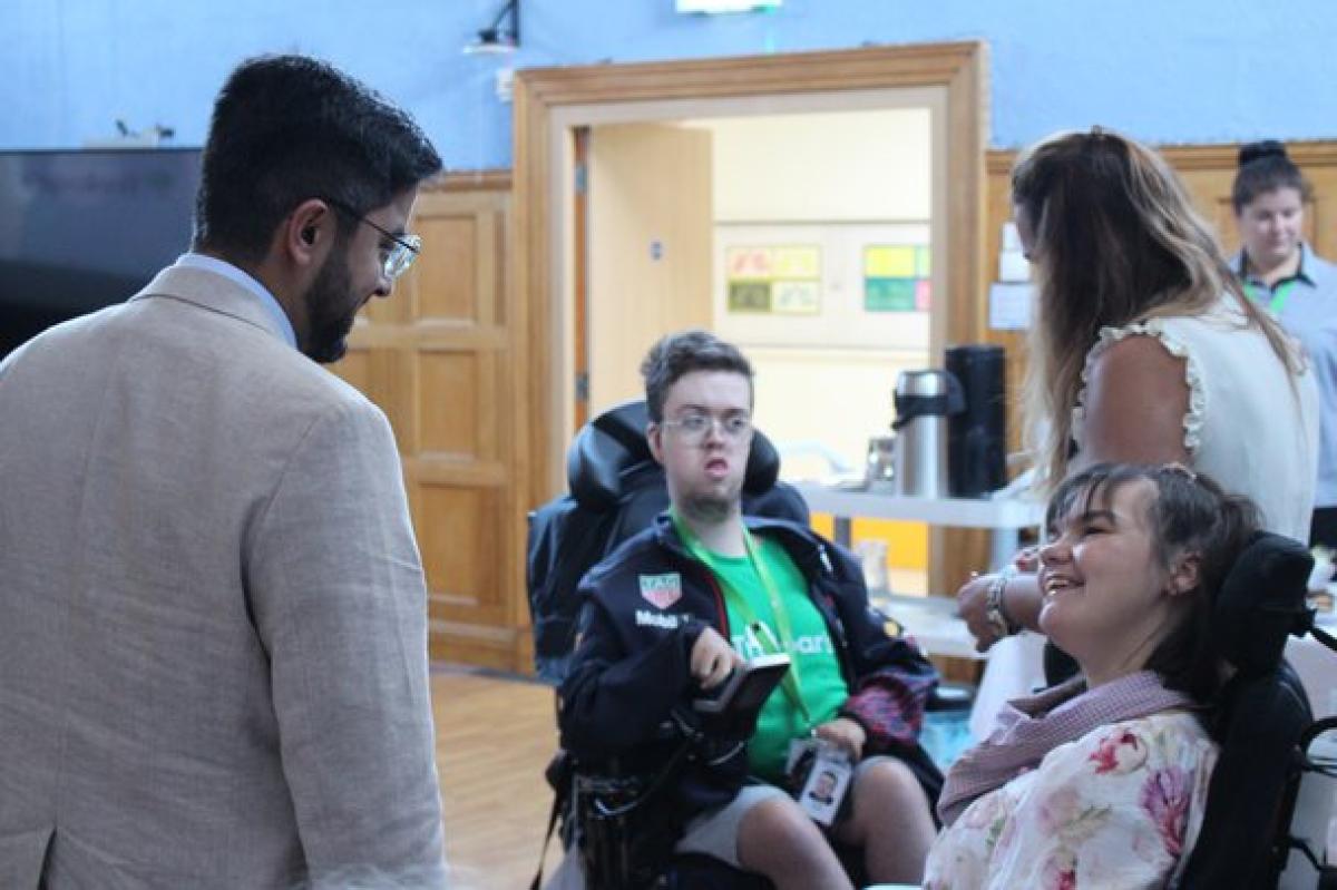 Treloar's students talking to visitors at Treloar's event.