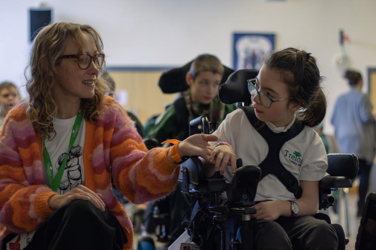 Treloar class teacher with a student 