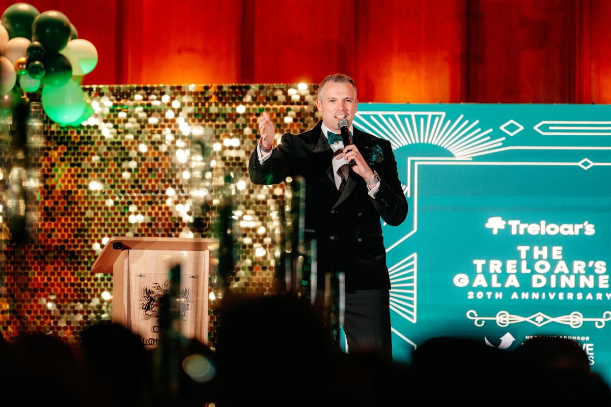 Host, Michael Kurn on stage