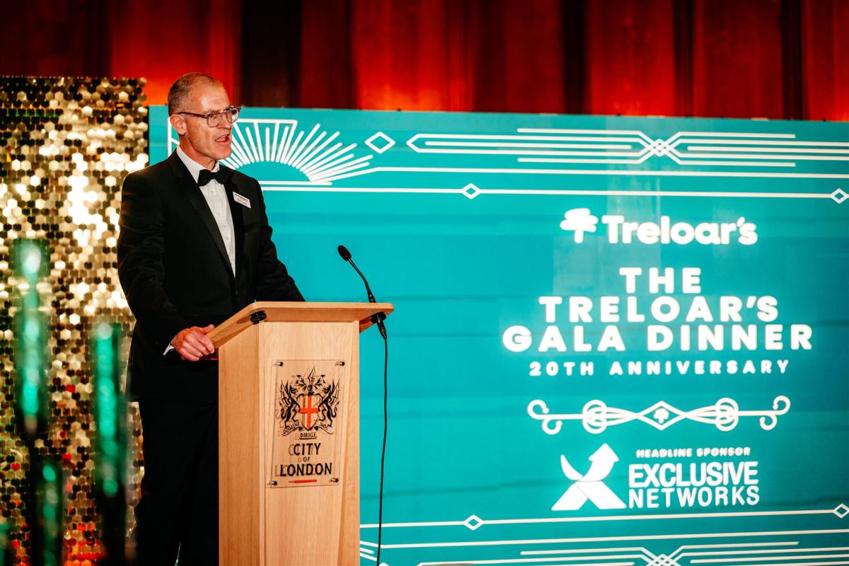 Martin Ingram on stage at The Treloar's Gala Dinner