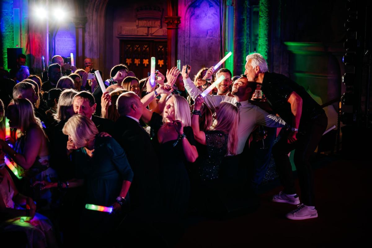 Guests dancing with Martin Kemp on stage