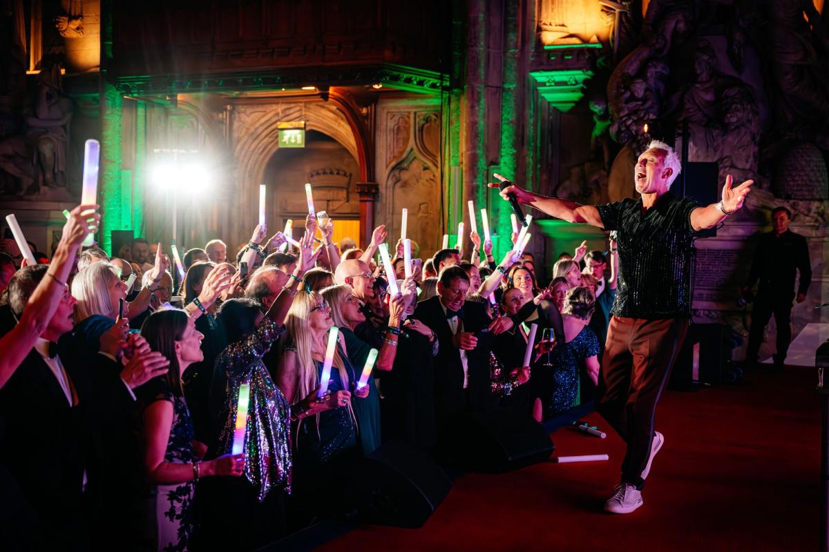 Guests dancing with Martin Kemp on stage