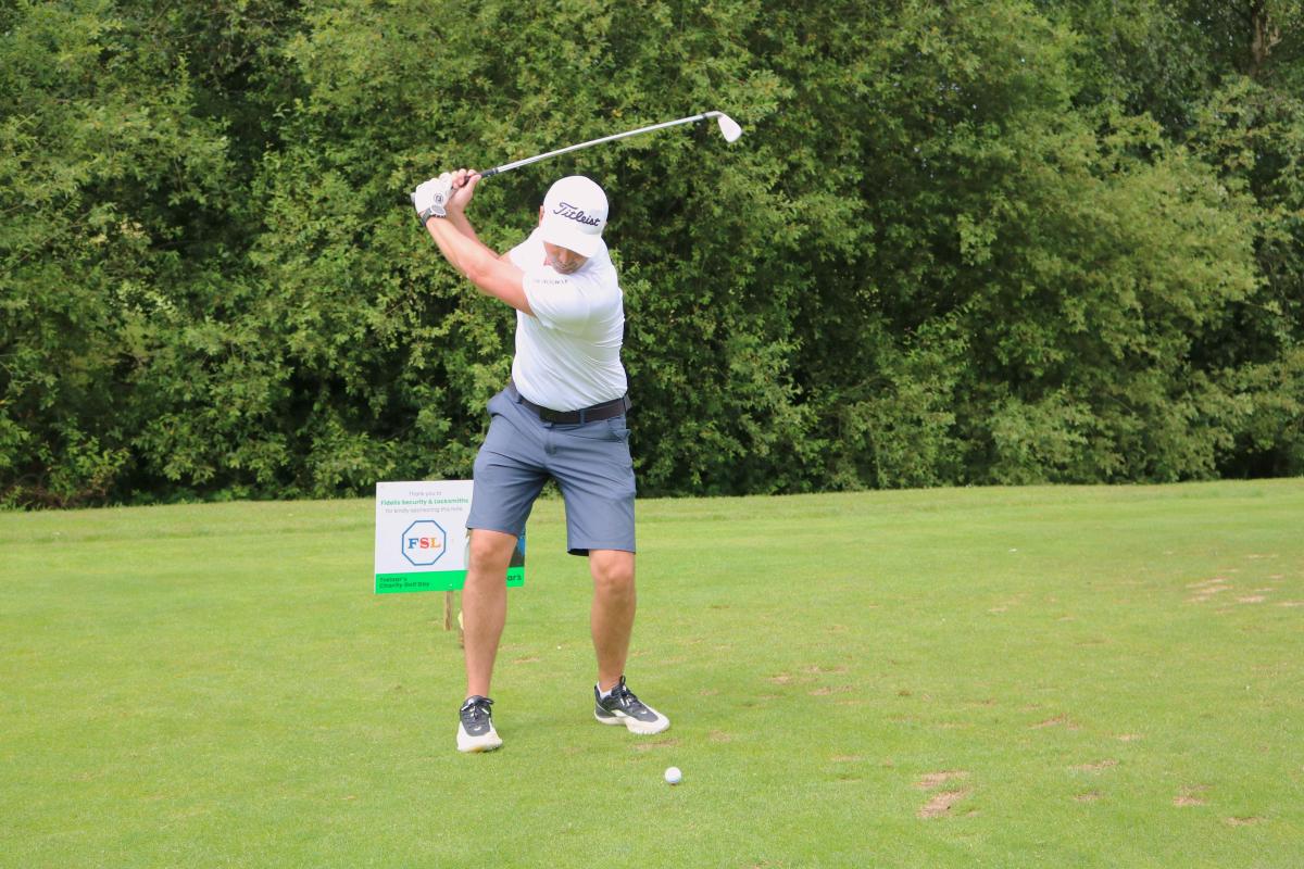 Golfer taking a shot