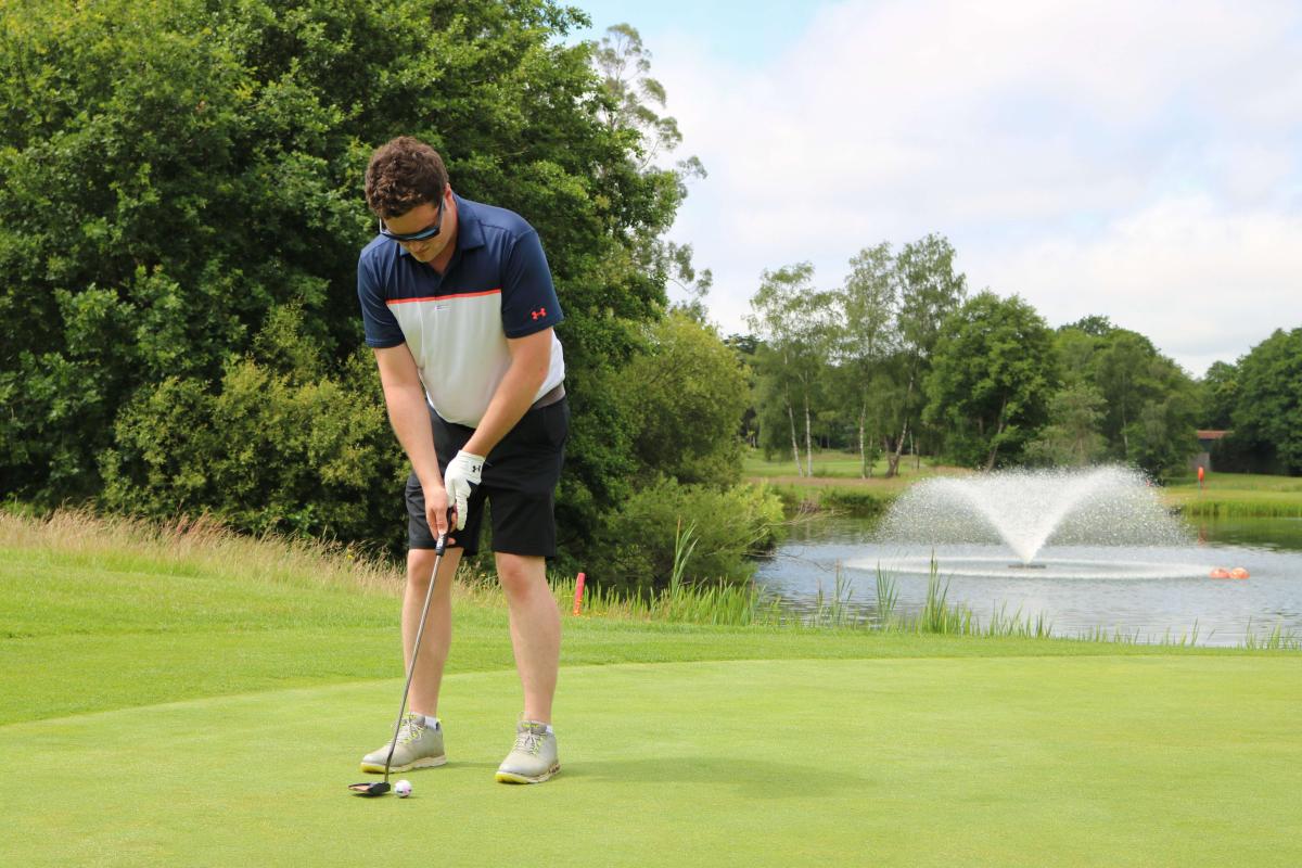 Golfer taking a shot