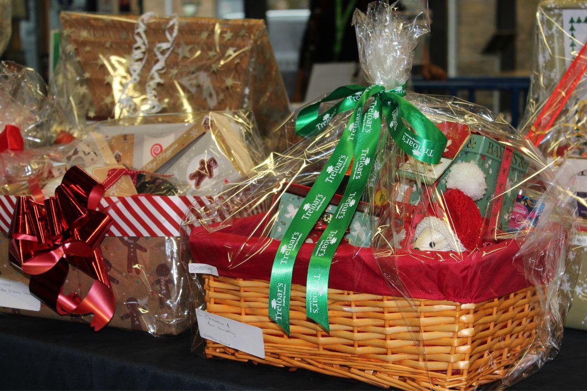 A red and green themed Christmas hamper