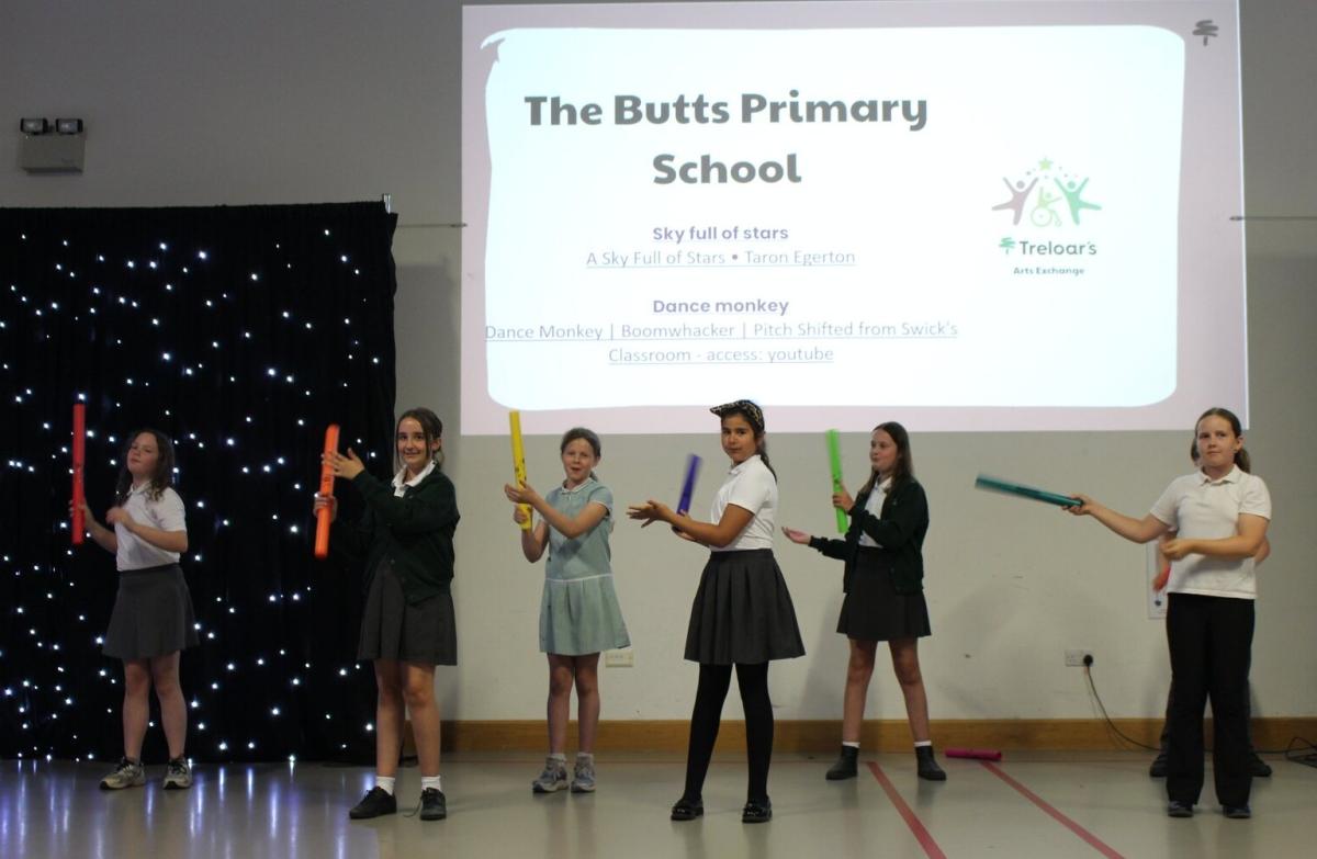 Students perform with Boom Whackers at Treloar's Art Exchange