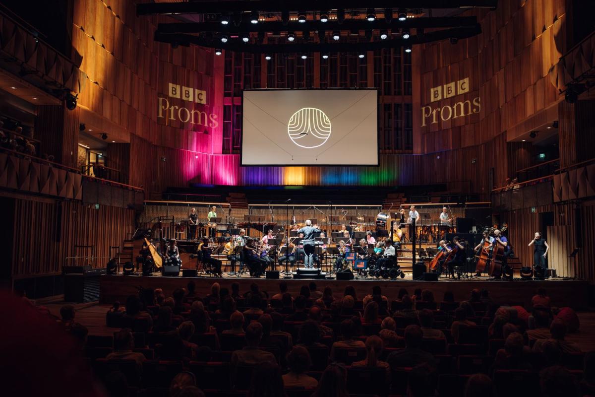 BBC Proms concert featuring National Open Youth Orchestra musicians on Bristol Beacon stage.