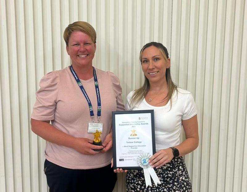 Holly Larvan, Treloar's Supported Internship Technician and Gemma Foreman from Southampton Airport posing for a photo with an award and a certificate.