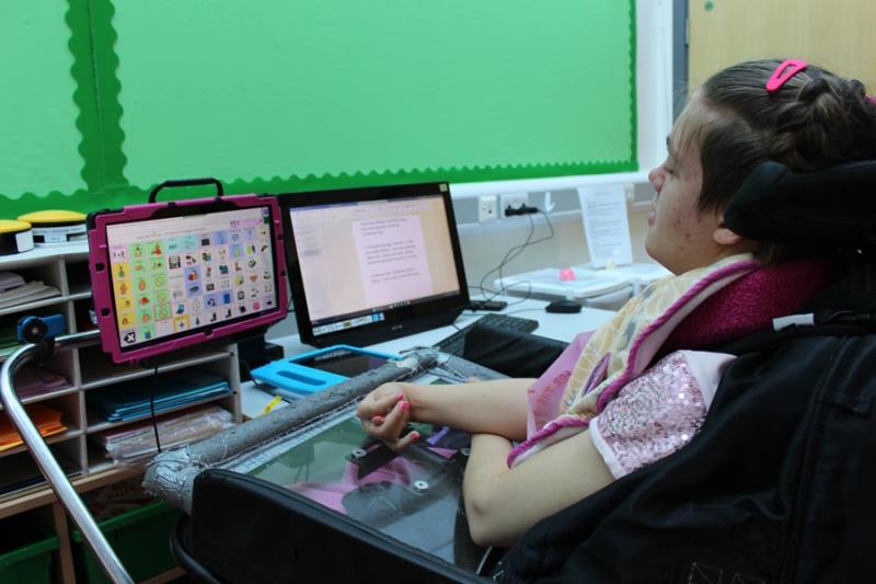 Treloar's student using her AAC device during her lesson.