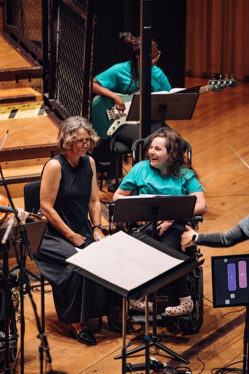 College student playing the Clarion on stage with the National Open Youth Orchestra 