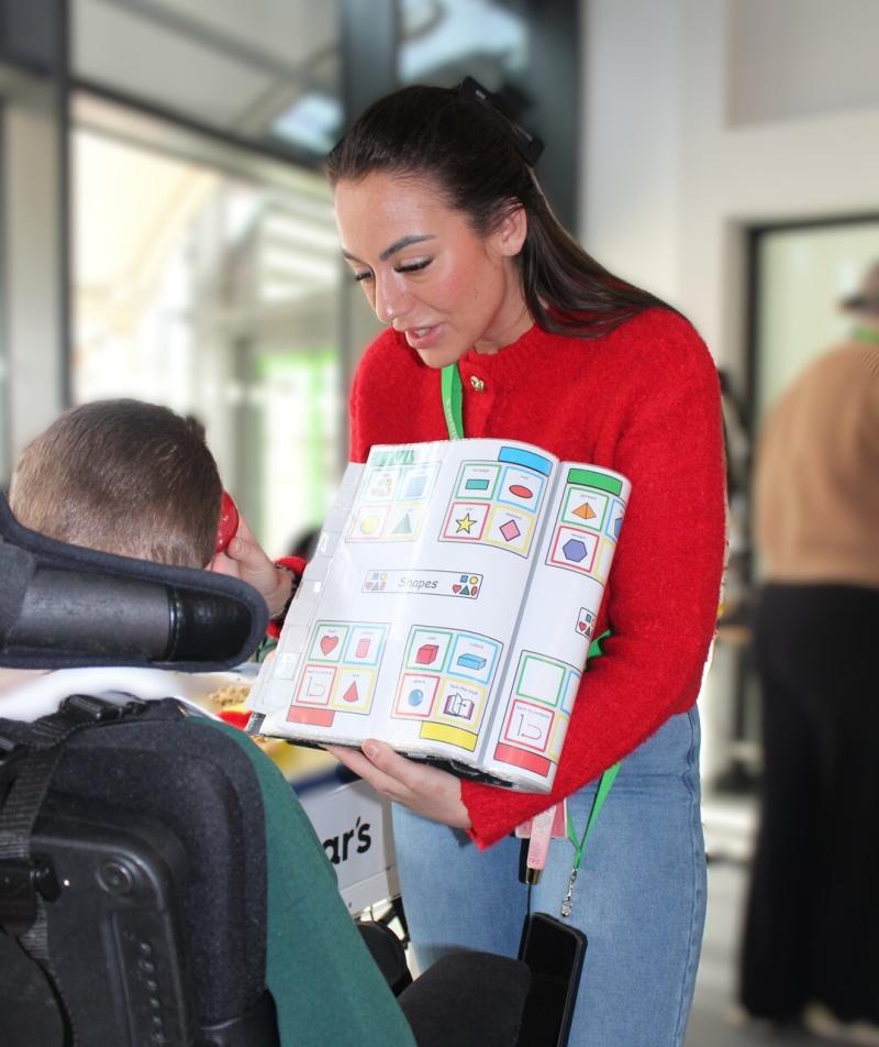 Student support assistant using a communication book