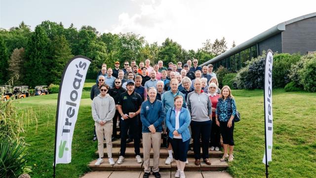 A group shot of golfers at Treloar's Golf Day event.