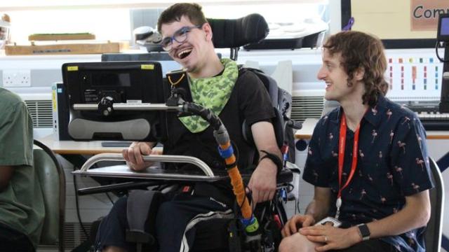 Treloar College student James and Clarion teacher Ollie taking part on College Orchestra rehearsal