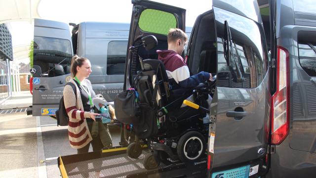 Treloar College student using a Tail lift to board a minibus