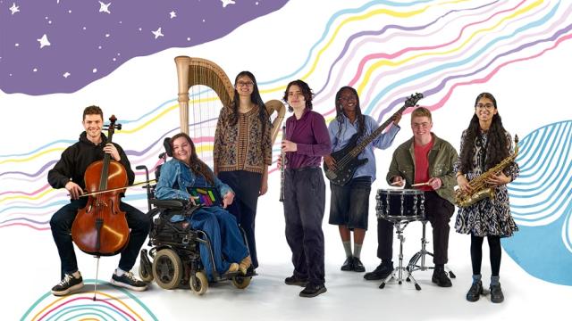 Group of seven diverse musicians with various instruments including cello, harp, bass guitar, drums, and saxophone against a colorful, starry background.
