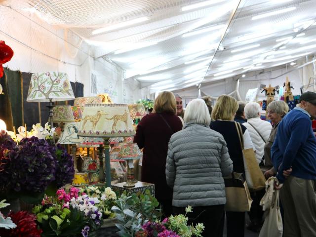 Stalls and shoppers at The Dummer Fair