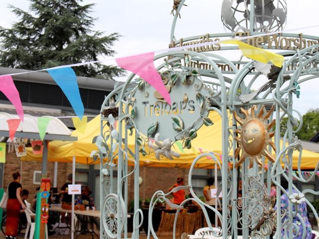 Treloar's archway and a colourful bunting across of it.