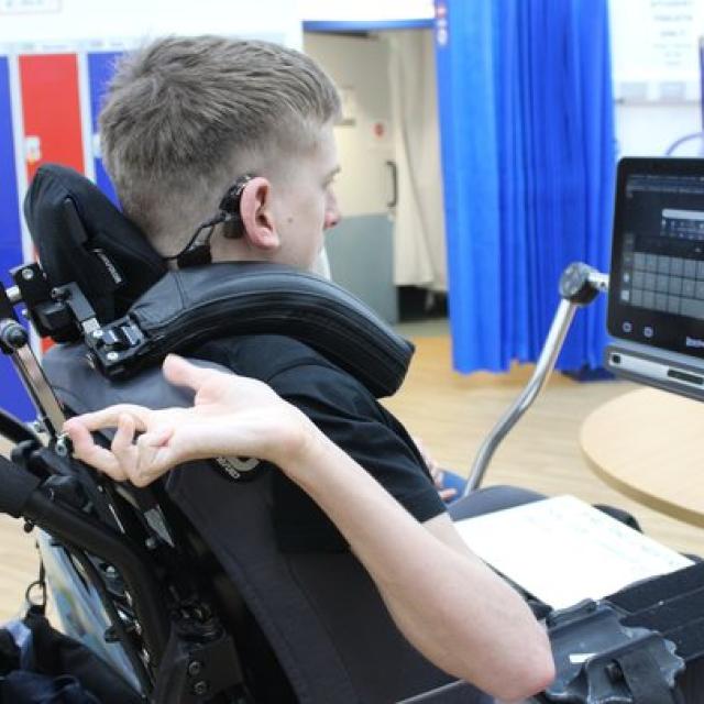 Treloar College using an assistive communication device operated with eye gaze. 