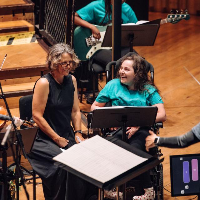 College student playing the Clarion on stage with the National Open Youth Orchestra 