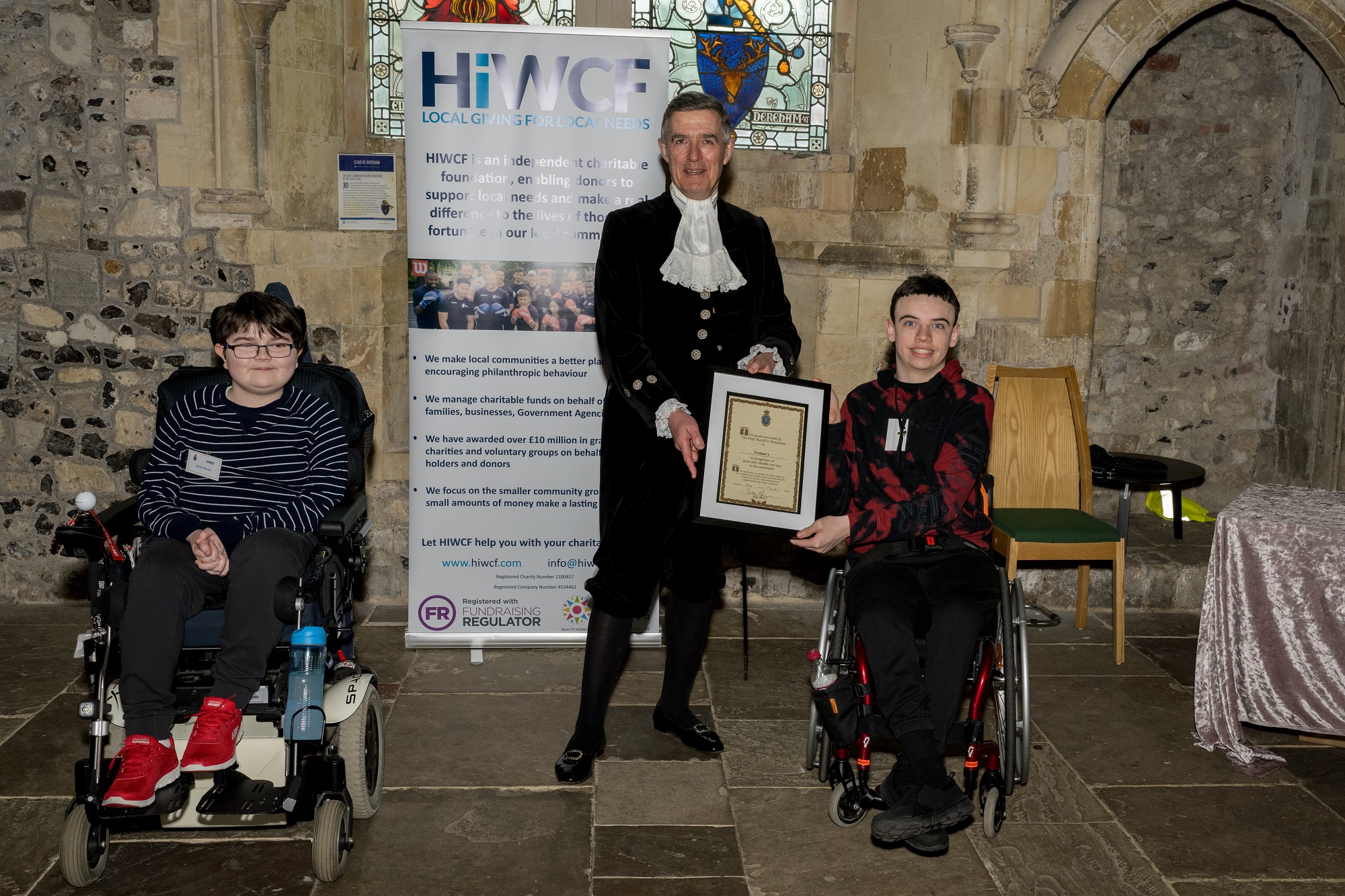 Treloar's stuedent receive award from High Sheriff of Hampshire