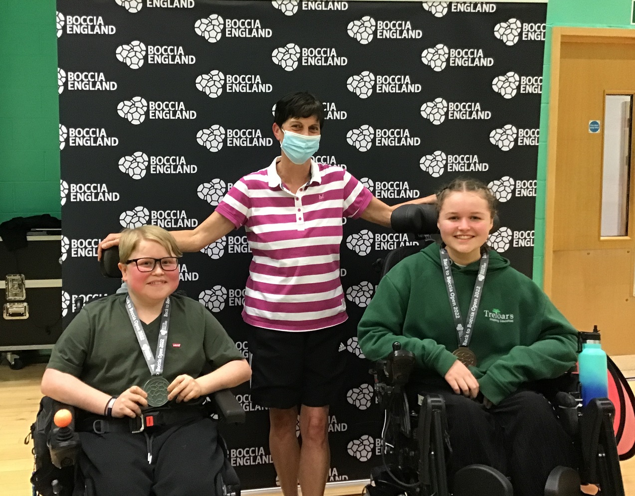 Students Sophie and Harrison wearing their Back to Boccia medals at the Hatfield competiton
