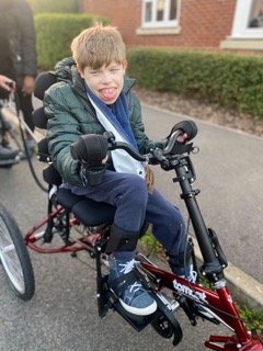 jasper riding his new Tomcat Trike