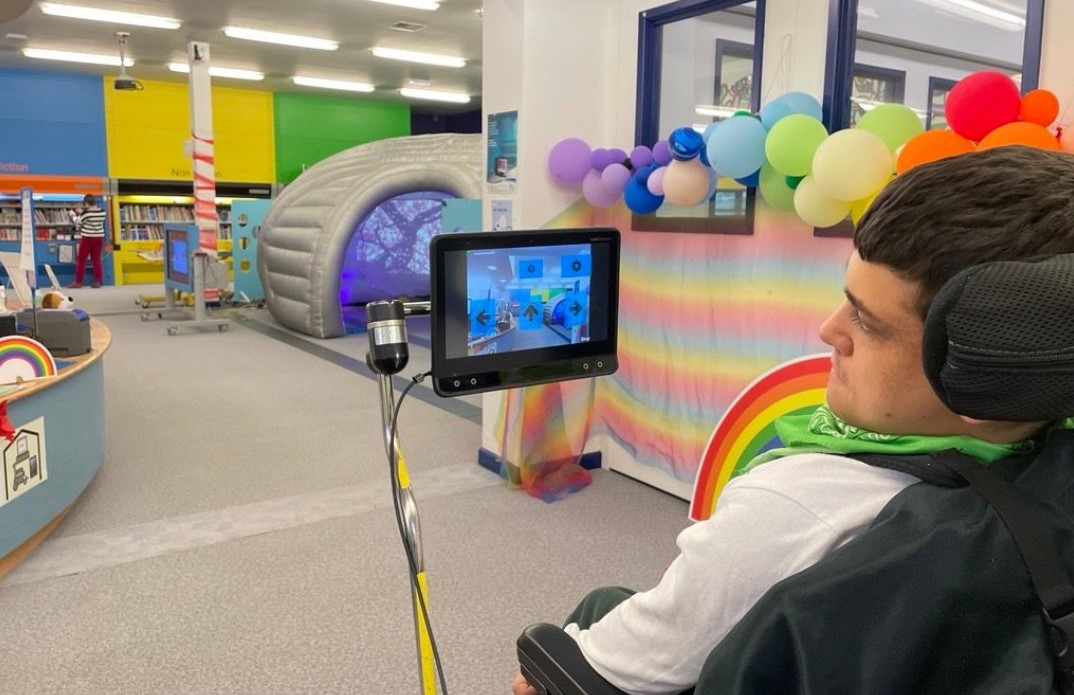 Student using Ability Drive software to drive his wheelchair using eyes only