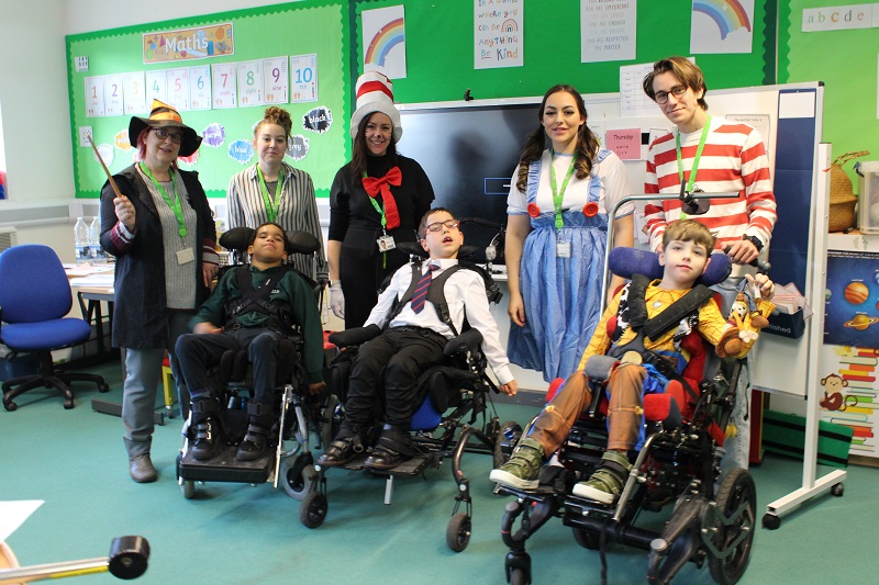 Group of students and teachers dressed up as their favourite book characters