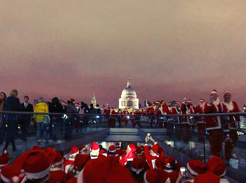 Runners in Santa Costumes overlooking St Paul's Cathedral