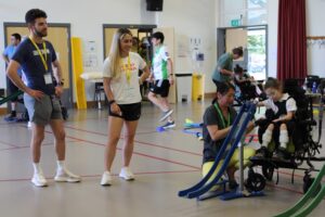 Ali Smith and Zac Shaw during a boccia session with Treloar Primary student
