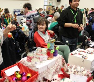 One of Treloar's students browsing through the stalls at Treloar's Christmas Fair