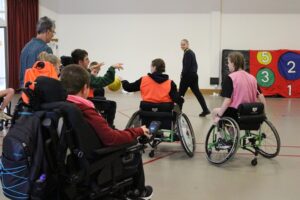 Day of Disability Sports at Treloar's: students playing an accessible version of basketball - all students are using wheelchairs